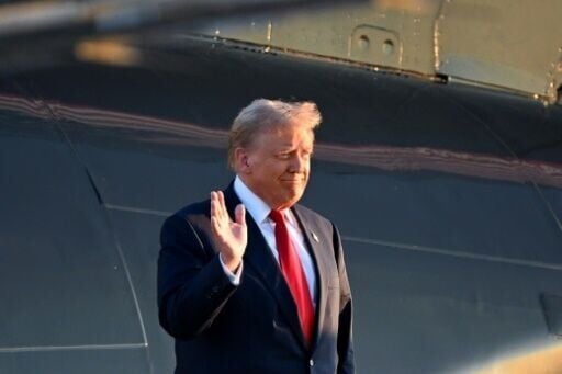 Former US President and Republican presidential candidate Donald Trump steps off his plane upon arrival at Philadelphia International Airport in Philadelphia, Pennsylvania on September 10, 2024.  Kamala Harris and Donald Trump are poised to face off in ...